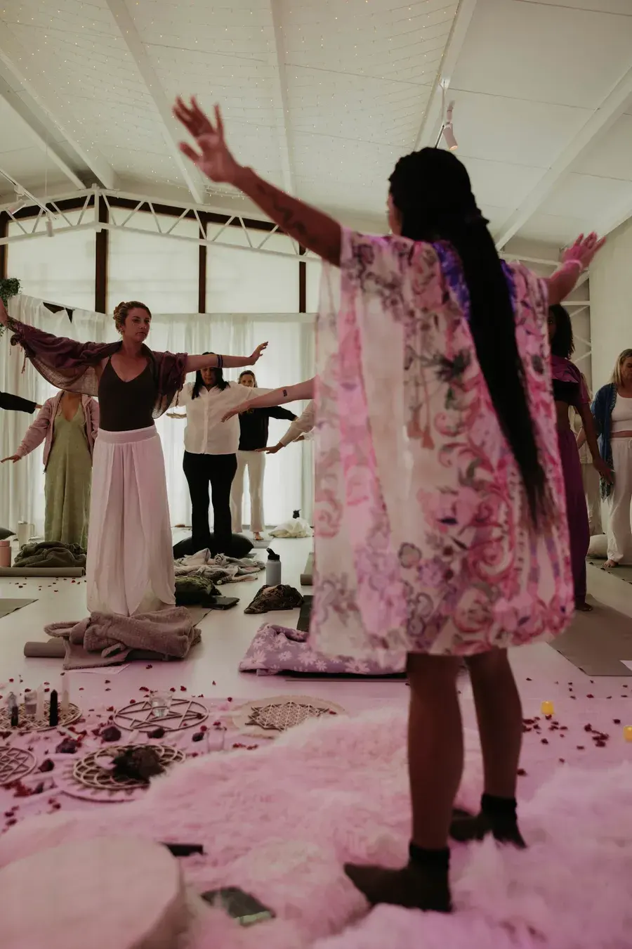 Sarah guiding breathwork in the room